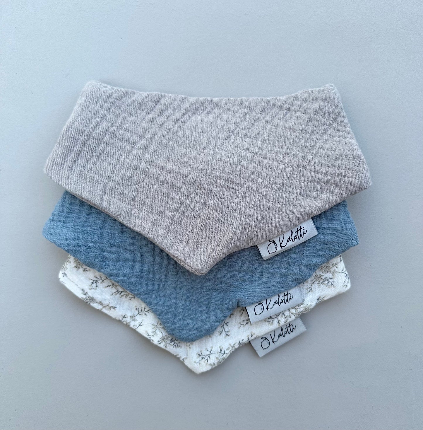 Dreieckstuch mit Druckknopf